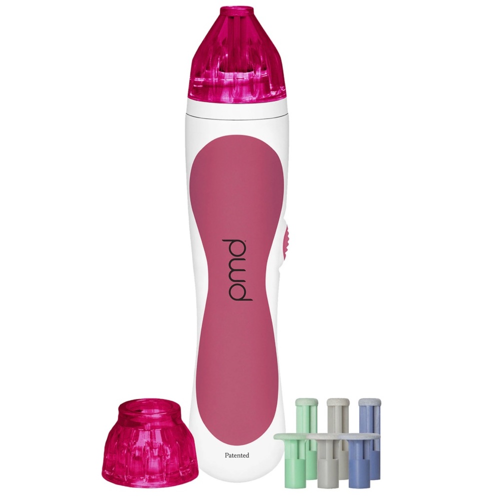 PMD MICRODERMABRASION DEVICE. COMES WITH EXTRA DISCS.